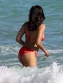 Padma Lakshmi in Red Bikini at Beach in Miami