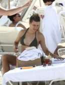 Eugenie Bouchard shows off her toned bikini body on the beach in Miami