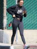 Nina Dobrev in Black Leggings, Walking her Dog Maverick in Hollywood