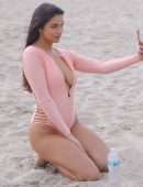 Tao Wickrath in Swimsuit on the Beach in Miami