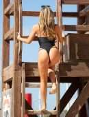 Alicia Oates at The Bachelor Contestant in a Black Swimsuit in Tenerife