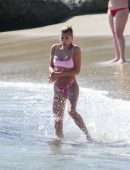 Hailey Baldwin in Pink Bikini at the Beach