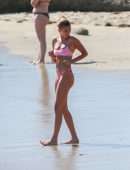 Hailey Baldwin in Pink Bikini at the Beach