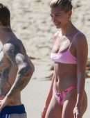 Hailey Baldwin in Pink Bikini at the Beach