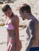 Hailey Baldwin in Pink Bikini at the Beach