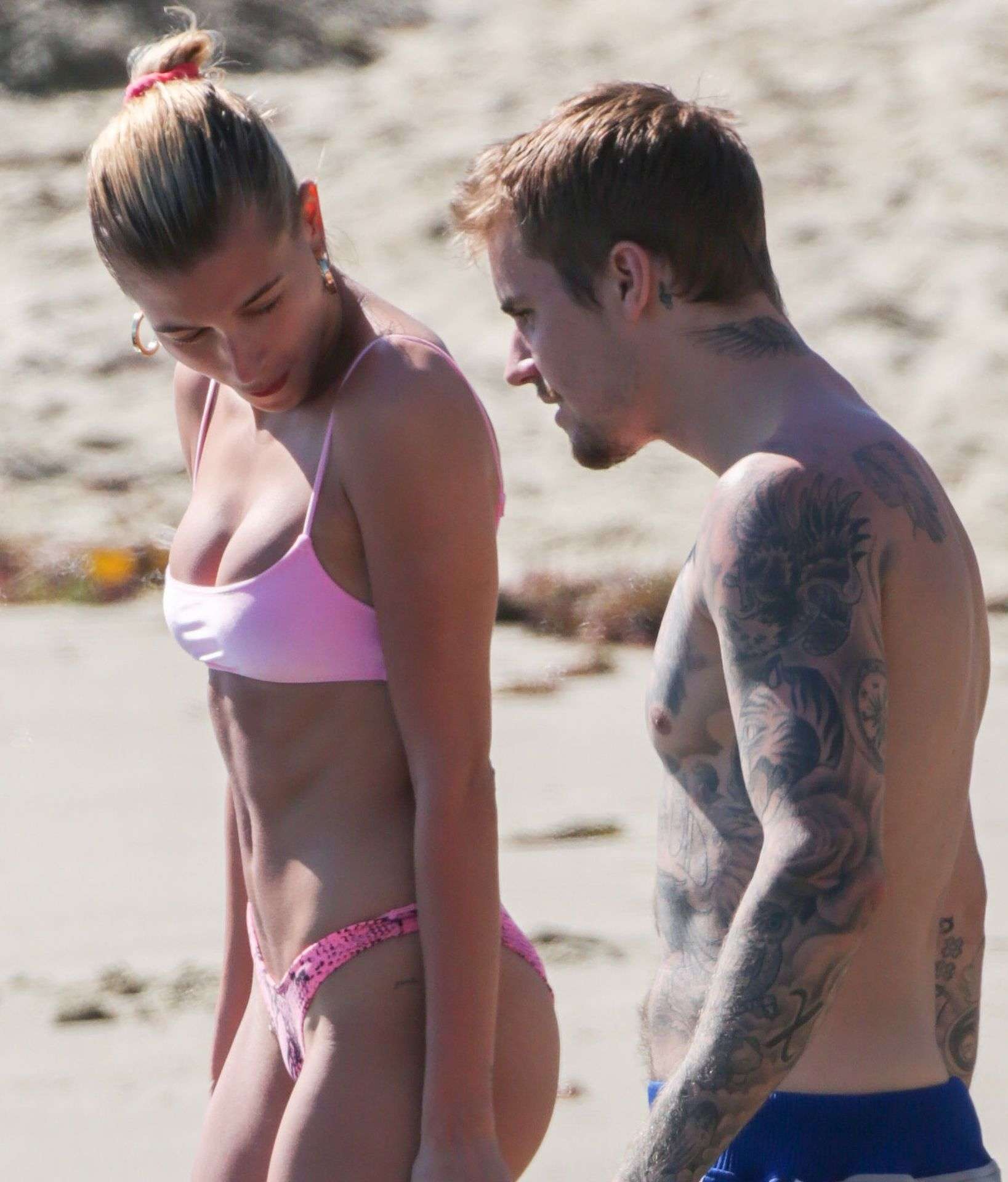 Hailey Baldwin in Pink Bikini at the Beach