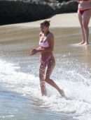 Hailey Baldwin in Pink Bikini at the Beach
