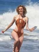 Ireland Baldwin in “138 Water” Swimsuit Photoshoot Candids in Malibu