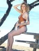 Ireland Baldwin in “138 Water” Swimsuit Photoshoot Candids in Malibu
