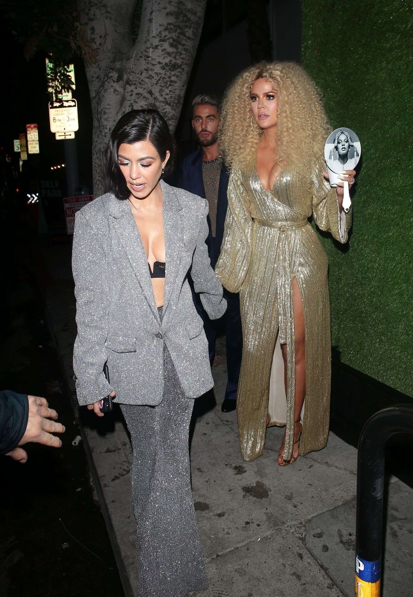 Kourtney Kardashian and Khloé Kardashian at the Warwick Nightclub in Hollywood