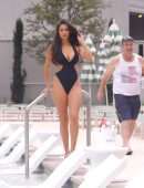 Tao Wickrath in Black Swimsuit at the Pool in Las Vegas