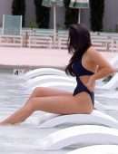 Tao Wickrath in Black Swimsuit at the Pool in Las Vegas