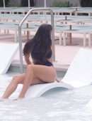 Tao Wickrath in Black Swimsuit at the Pool in Las Vegas