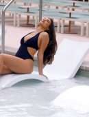 Tao Wickrath in Black Swimsuit at the Pool in Las Vegas