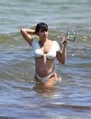 Jackie Cruz in White Bikini Relaxes on Miami Beach