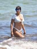 Jackie Cruz in White Bikini Relaxes on Miami Beach