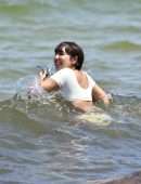 Jackie Cruz in White Bikini Relaxes on Miami Beach