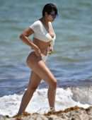 Jackie Cruz in White Bikini Relaxes on Miami Beach