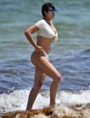 Jackie Cruz in White Bikini Relaxes on Miami Beach