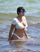 Jackie Cruz in White Bikini Relaxes on Miami Beach