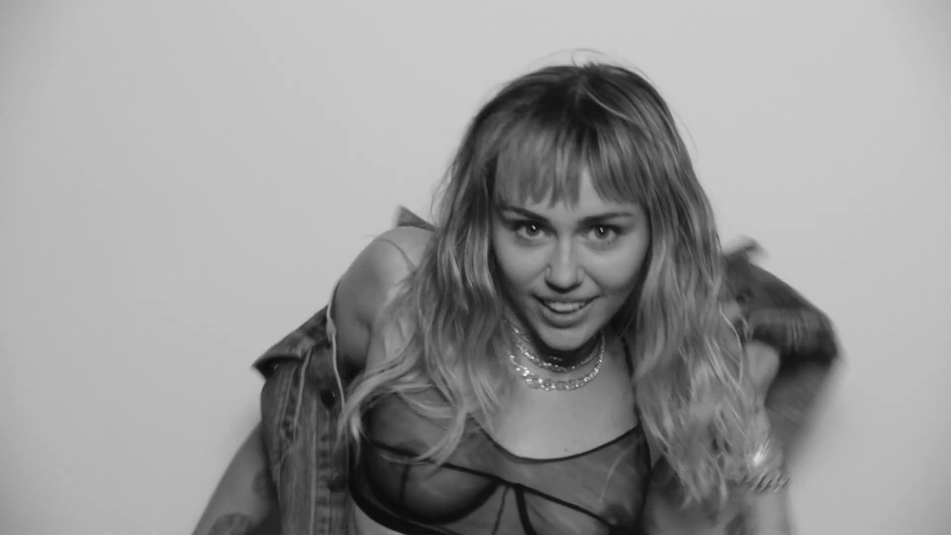 Miley Cyru See-Through Bra in “D.R.E.A.M.” Music Video