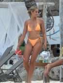 Natalie Roser in Orange Bikini on the Beach in Tulum