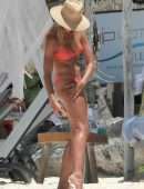 Natalie Roser in Orange Bikini on the Beach in Tulum