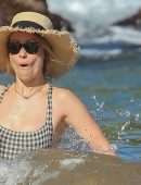 Olivia Wilde in Swimsuit at a Beach in Hawaii