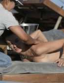 Alessandra Ambrosio in Bikini on a Beach in Mykonos