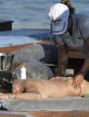 Alessandra Ambrosio in Bikini on a Beach in Mykonos