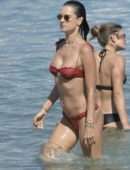 Alessandra Ambrosio in Red Bikini at the Beach in Mykonos