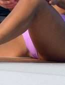 Christina Milian Booty and Pokies in Purple Bikini on a Yacht in France