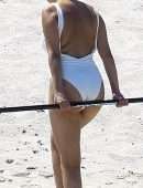 Selena-Gomez-Booty-in-White-Swimsuit-25