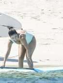 Selena-Gomez-Booty-in-White-Swimsuit-26
