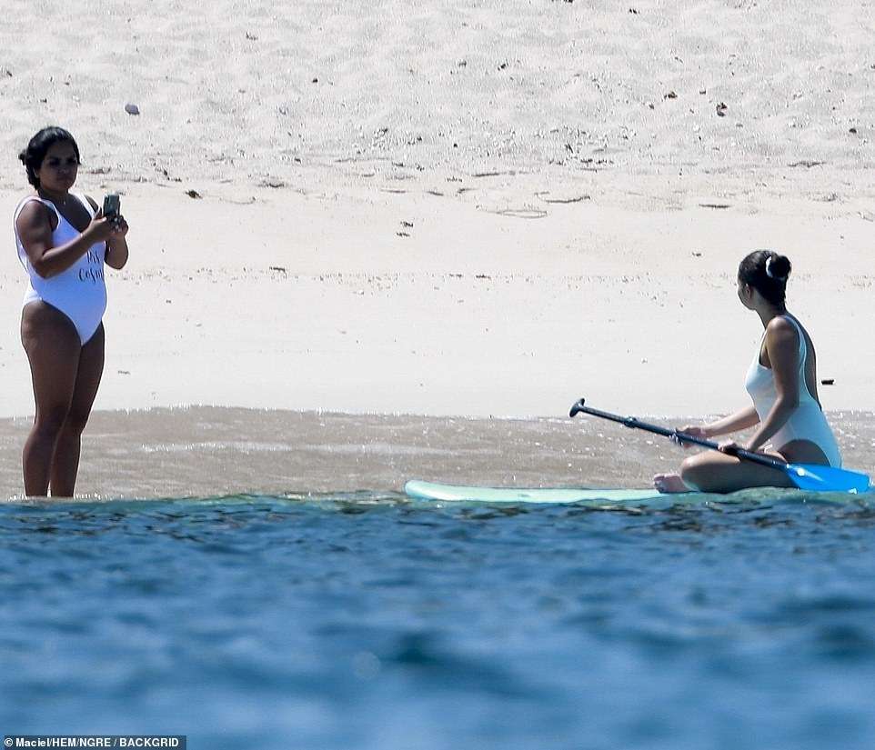 Selena-Gomez-Booty-in-White-Swimsuit-33