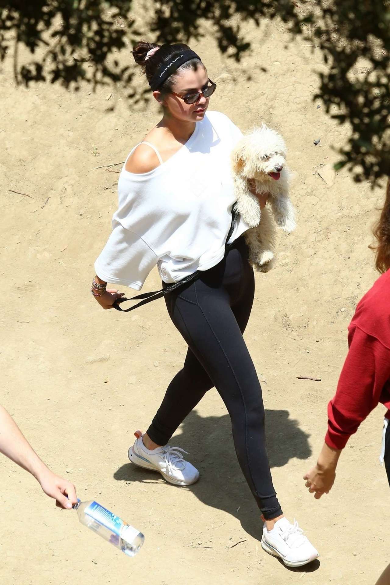 Selena Gomez Carrying a New Puppy Out for a Hike with Friends in Los Angeles