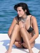 Bella Thorne in Black Bikini in Sardinia