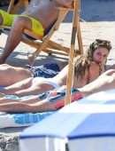 Heidi Klum in White Swimsuit in Capri