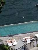 Miley Cyrus Booty in Bikini in Lake Como