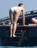 Nathalie Emmanuel Booty in White Swimsuit in Italy