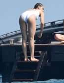 Nathalie Emmanuel Booty in White Swimsuit in Italy