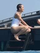 Nathalie Emmanuel Booty in White Swimsuit in Italy