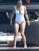 Nathalie Emmanuel Booty in White Swimsuit in Italy