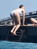 Nathalie Emmanuel Booty in White Swimsuit in Italy