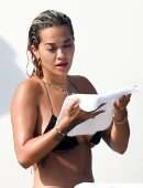 Rita Ora Booty in Black Bikini in Porto Cervo