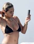 Rita Ora Booty in Black Bikini in Porto Cervo