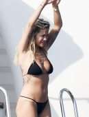 Rita Ora Booty in Black Bikini in Porto Cervo