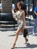 Sarah Hyland Leggy on “Extra” at Universal Studios Hollywood in Universal City