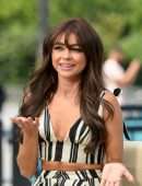 Sarah Hyland Leggy on “Extra” at Universal Studios Hollywood in Universal City
