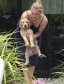 Sophie Turner in Bikini with Dog in Miami